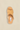 Tan sandal with a visible brand label on a beige background