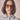 Woman wearing soda cisco sunglasses with a neutral background