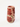 Ceramic vase with red floral pattern on a white background