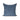 Blue textured pillow on a white background