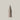 Beige spray bottle labeled 'MIST' on a light gray background