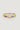 Gold ring with three colored gemstones on a white background