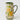 Ceramic pitcher with lemon design on a white background