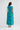 Full-length back view of a model wearing the Addison Dress in Bloomsbury Floral showing its dropped waist and gathered skirt.