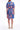 Amalia Valencia Dress crafted from 100% hemp featuring a vibrant blue and red floral print shown in a back product view.
