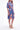 Amalia Valencia Dress crafted from 100% hemp featuring a vibrant blue and red floral print shown in a side product view.