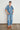 Ascend Pant Mid Wash Denim full length view featuring a relaxed casual fit, high-rise silhouette, and well-worn indigo wash.