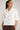 Barrymore Shirt featuring a relaxed silhouette, collared neckline, and button-through front in white broderie anglaise.