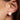 Bea pearl stud worn by a model to showcase the everyday round pearl design.