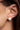 Bea pearl stud worn by a model to showcase the everyday round pearl design.
