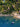 Beach House book interior featuring an aerial view of beachfront coastal cabins and crystal clear waters.