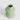 Top-down view of the tall green polystone vase highlighting its opening and organic finish.