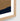 Close-up detail of the natural timber frame and white border on the Blue Abstracts 83x83cm framed print.