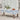 Blue fish tablecloth 140cm x 250cm featuring a blue fish print on a white base cotton fabric shown in an outdoor table setting.