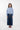 Front view of the blue and white striped cropped shirt with drop shoulders.