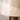 Close-up view of the blush resin shade and antique brass base on the Blush resin shade and brass base table lamp.