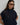 Carrie Zip Top knitted from 100% Pima cotton in an open stitch featuring a half-zip funnel neck and relaxed fit in navy shown in an upper body view.