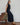 Casey Fringe Tank fine knit with fringe detailing and extended shoulders in navy shown in a profile view.