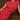 Casey Fringe Tank fine knit with fringe detailing and ribbed neckline in red shown in a close up view.