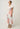 Side view of the Cattleya linen maxi dress in Nautilus Bloom print showing the A-line maxi silhouette.