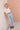 Celeste Pant Daisy lifestyle full view showcasing the comfortable straight wide leg and cute embroidered daisy pattern for casual wear.