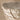 Close-up view of the subtle, leaf-like veining and pale textural ceramic finish.