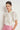 Charm Top Painterly Bloom front close-up view featuring a mandarin collar neckline with front keyhole opening and button in painterly bloom.