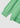 Close-up detail of the classic V-neck sweater in green showing ribbed cuffs and side hem slits.