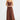 Chocolate brown bias-cut linen slip dress with thin straps and a midi-to-maxi length.