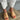 Side angled view of the Command Heel in sandcastle showcasing its supportive wide leather strap and chic contemporary profile.