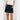 Composure Short in Navy featuring an elasticated waistband with a drawstring and front cutaway pockets in a French terry fabric.