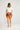 Coral Shorts Hibiscus Breeze shown from the back highlighting the comfortable warm-weather design.