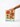 Hand holding a block with floral design and 'DAHLIA' text on a white background