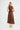 Back view of the Dickens linen dress in chocolate featuring button closure details.