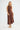 Front view of the Dickens linen dress in chocolate showing the bias-cut silhouette.