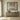 Wooden sideboard with decorative items and abstract art in a room.