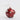 Dotty Capiz Red Bauble featuring a red laminated capiz finish with white dot details and gold glitter accents for festive tree decoration.