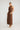 Edris Dress Chocolate featuring a high cowl neckline and bias cut in satin.