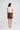 Esplanade Short in coffee back view, showing the relaxed silhouette and back welt pocket detail.