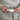 Handcrafted ceramic serving spoon in white, large 10cm by 5cm size, dishwasher and microwave safe, minimalist kitchenware.
