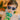Frankie Ray Kids Sunglasses styled on a child, showcasing an upsized classic retro design in solid blue with Category 3 UV protection.