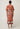 Back view of the Gisela linen column midi dress in amber vine showing the midi length and removable belt.