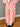 Grace striped skirt Blush/Red Stripe featuring a flat-panelled front waistband and elasticated back.