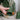 Green Metal Bells 10cm close-up view featuring a glossy green enamel finish and a natural rope hanger.