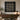 Modern living room with geometric wall art, wooden console table, and decorative items.