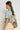 Back view of the Hail Top in mint kgari crafted in cotton poplin with short gathered sleeves and a contemporary silhouette.
