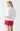 Hallie Tee back view featuring a straight hemline and 100% Cotton jersey fabric.