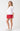 Hallie Tee side view featuring short sleeves and a straight hemline.