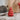 Hanging Tree red close-up view showcasing the 6cm high ceramic tree with natural twine for Christmas decorating.