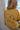 Happy Camper Reversible Tee butter-yellow side featuring hand-drawn Keep It Simple camping scene graphic across the back.